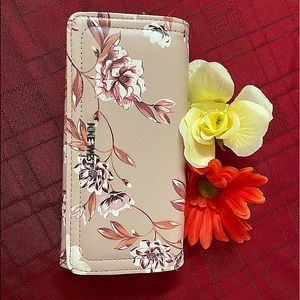 Gorgeous Nine West floral wallet.